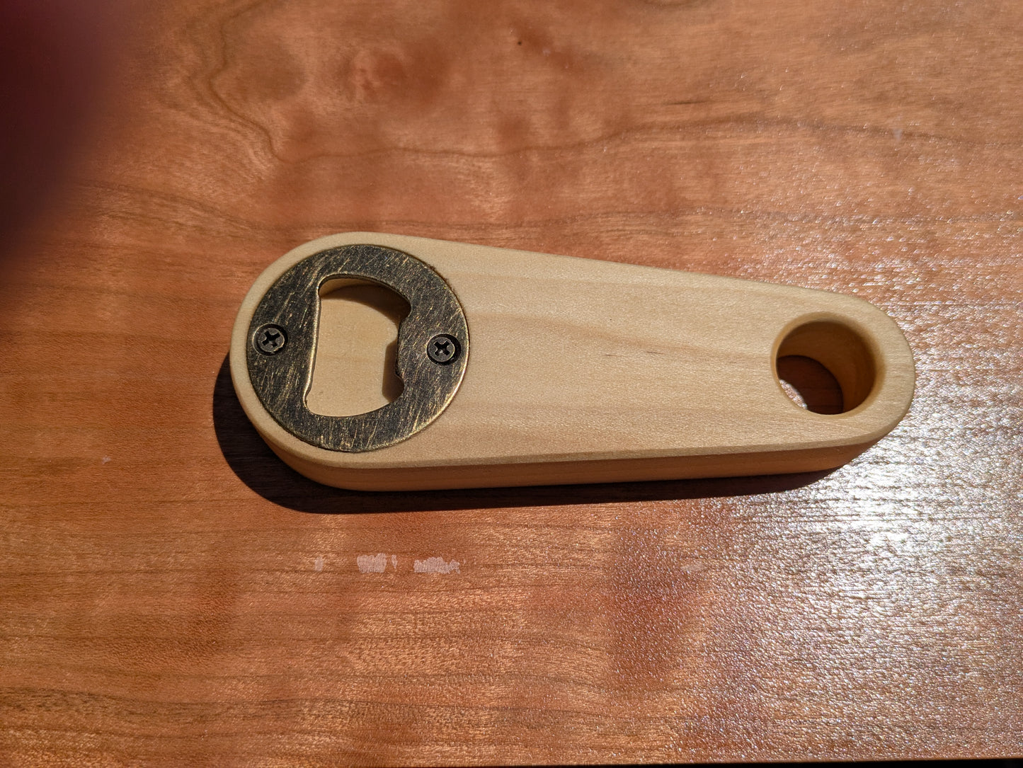 handmade hand sized bottle opener